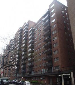 A 15-story brick apartment building in Manhattan.