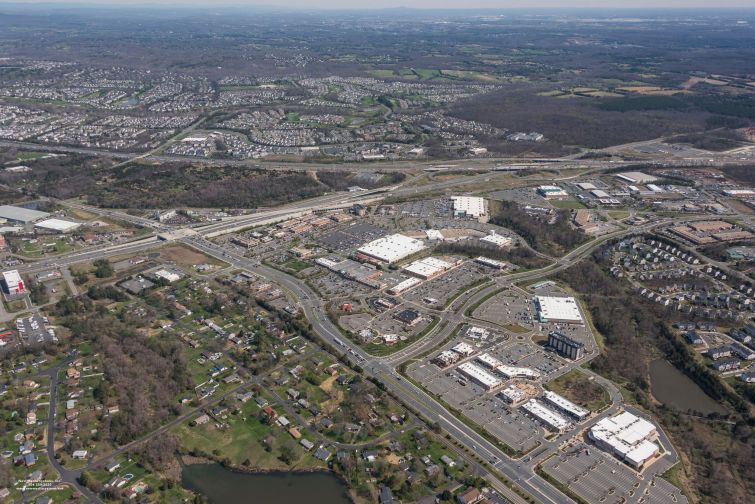 The Gainesville shopping center is about 30 miles west of Alexandria.