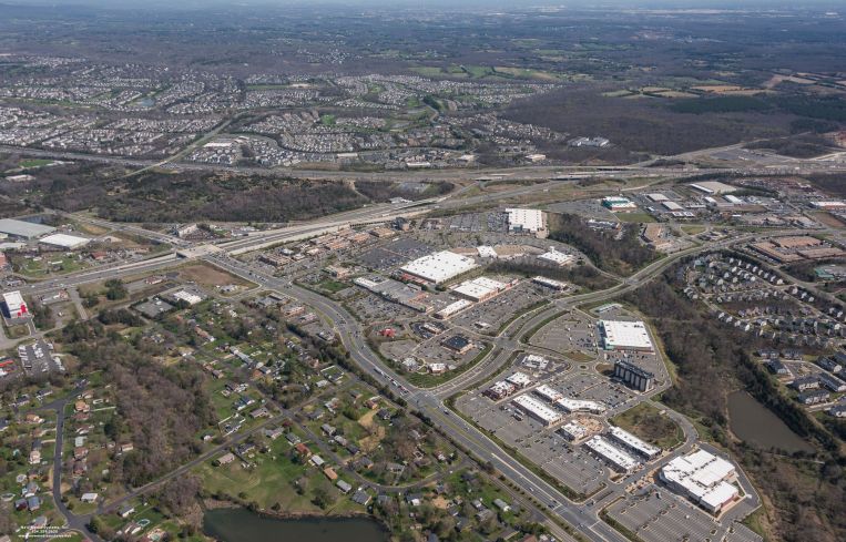 The Gainesville shopping center is about 30 miles west of Alexandria.