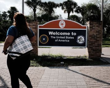 A sign welcomes people to the United States.