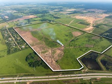 Johnson Development Services to take control of 318 acres alongside Highway 99 near Houston, Texas.
