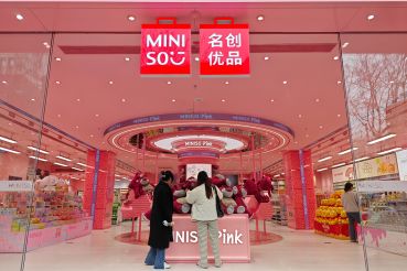 Customers shop at Miniso flagship store in Shanghai, China.