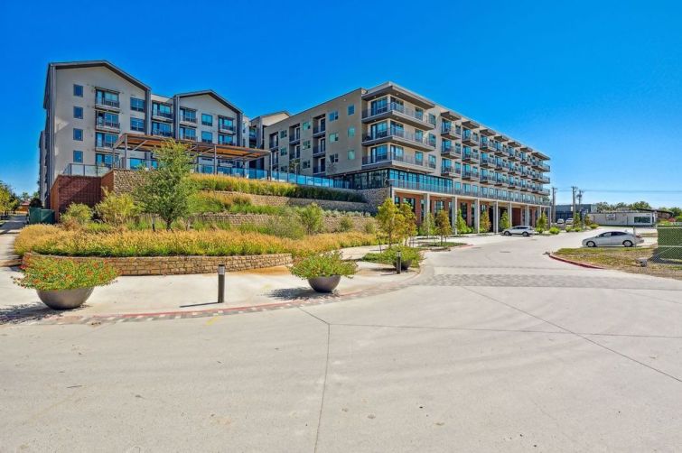 Crystal Springs, a two-building, newly-delivered, 387-unit multifamily property located in Fort Worth, TX.