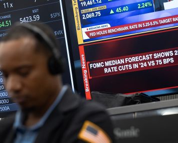Traders work in the S&P options pit at the CBOE