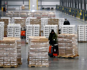 Pallets of frozen meat are moved through the Lineage Cool Port Oakland temperature controlled distribution center.