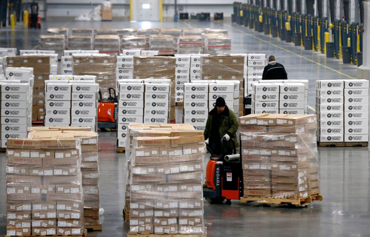 Pallets of frozen meat are moved through the Lineage Cool Port Oakland temperature controlled distribution center.