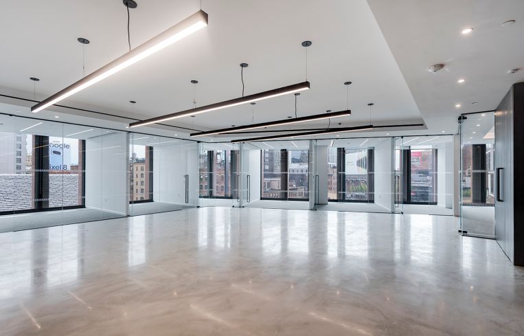 An empty office with panoramic windows.