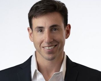 A man smiling.