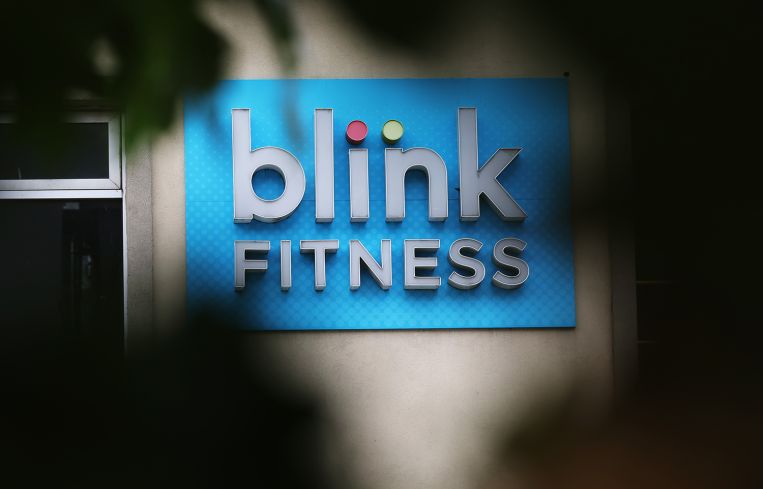 A sign for a Blink Fitness gym is seen on Flatbush Avenue in Brooklyn.