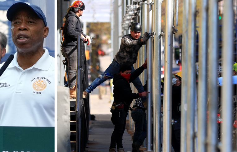 Mayor Eric Adams. Construction workers repair scaffolding outside a building in Brooklyn.