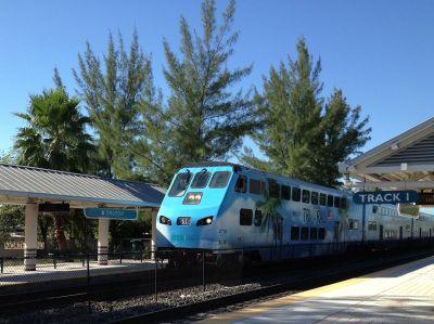 A train pulls into the Opa-Locka Tri-Rail station.