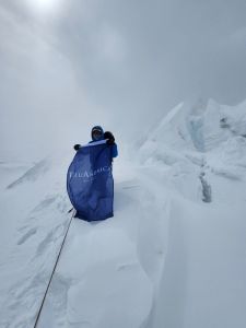 Ferrari on Everest's North Col with the TruAmerica flag. 