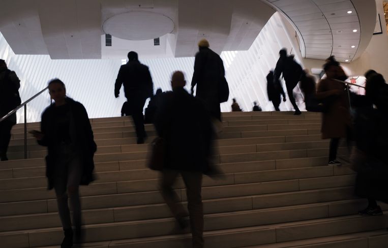 Commuters arrive at The Oculus at the World Trade Center in Manhattan.