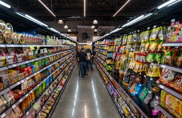 Shoppers browse an aisle at a 99 Ranch Market in Eastvale, Calif.