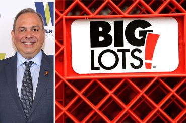 Big Lots CEO Bruce Thorn and a Big Lots' logo displayed on one of the store's shopping carts.