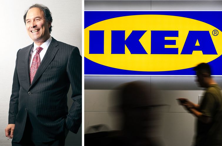 Extell founder and Chairman Gary Barnett and shoppers walk past a sign at an Ikea store.