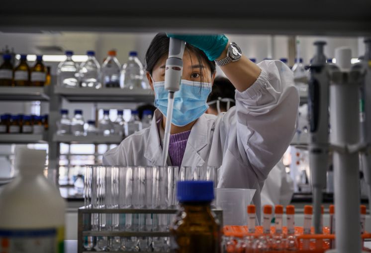 A technician works in a lab