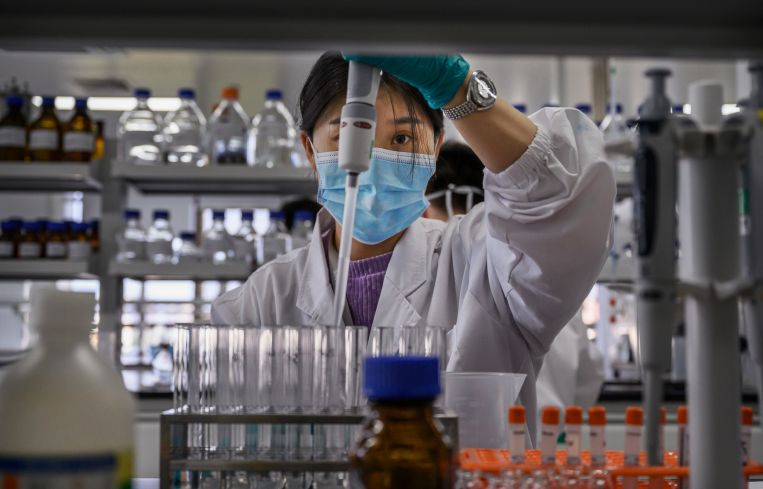A technician works in a lab