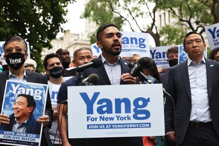 Assemblyman Kenny Burgos speaks during a rally for NYC Mayoral candidate Andrew Yang on May 2021.