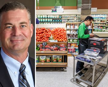 Publix CEO Kevin Murphy and a Publix employee stocks shelves in one of the company's supermarkets.