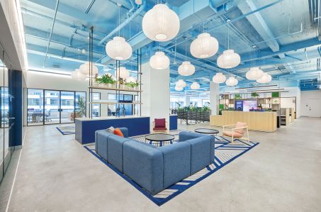 Vibrant Emotional Health painted the ceiling a calming baby blue at its new 80 Pine Street headquarters.