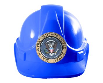 A blue hard hat with the United States' presidential seal on it.