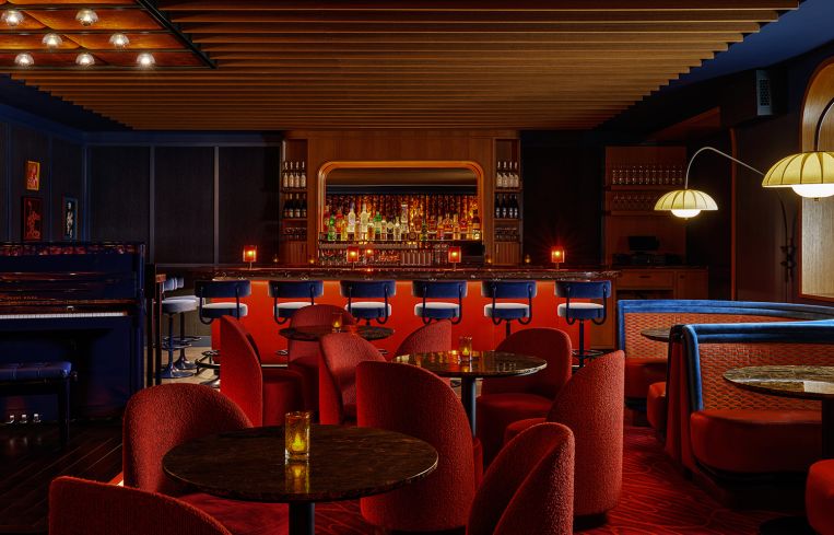 A scene of chairs inside a bar.