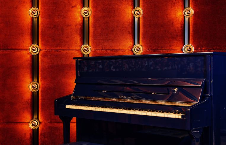 A blue piano in a bar.