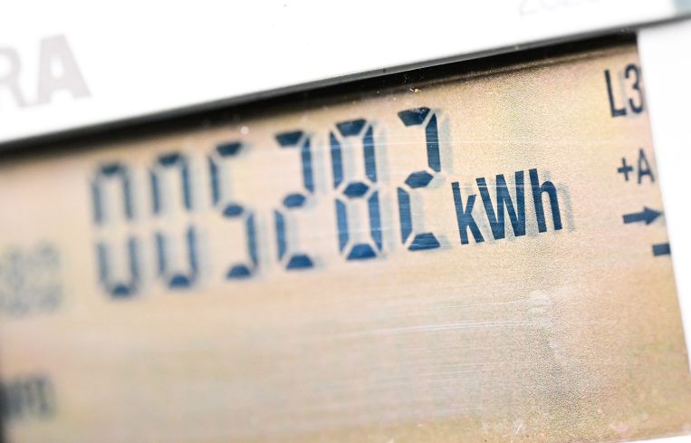 An energy meter with digital numbers on it.