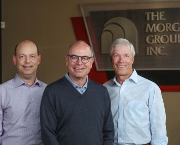 From left, Morgan Group's Stan D. Levy, Michael S. Morgan, and Alan Patton.