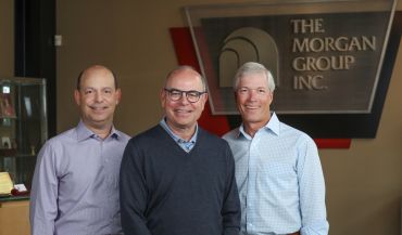 From left, Morgan Group's Stan D. Levy, Michael S. Morgan, and Alan Patton.