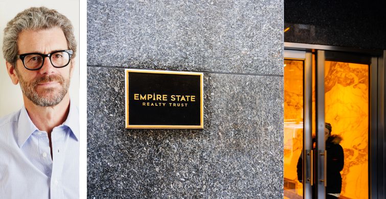 Anthony Malkin, CEO of Empire State Realty Trust, and their logo on a plaque.