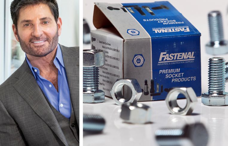Joe Simone, president Simone Development, and a sample of Fastenal products.