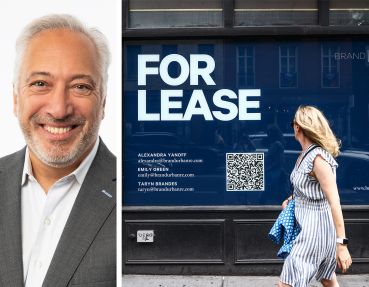 JLL's Patrick Smith and a "for lease" sign in the window of a building in Manhattan.