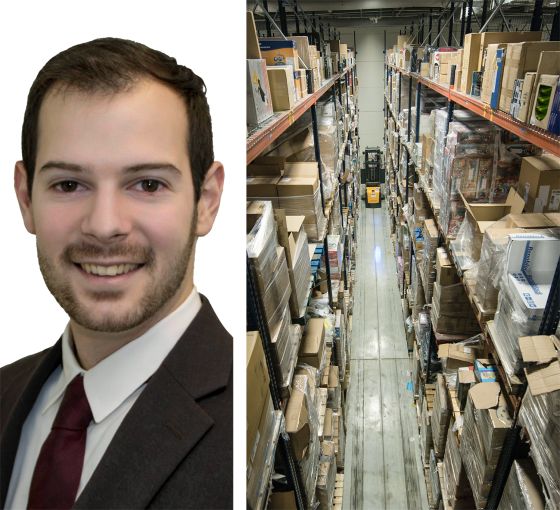 Dimitri Mastrogiannis, Senior Research Analyst for Cushman & Wakefield, and a industrial warehouse.