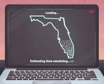 Image of a map of Florida on a laptop computer screen, and the image of Florida is taking forever to load.