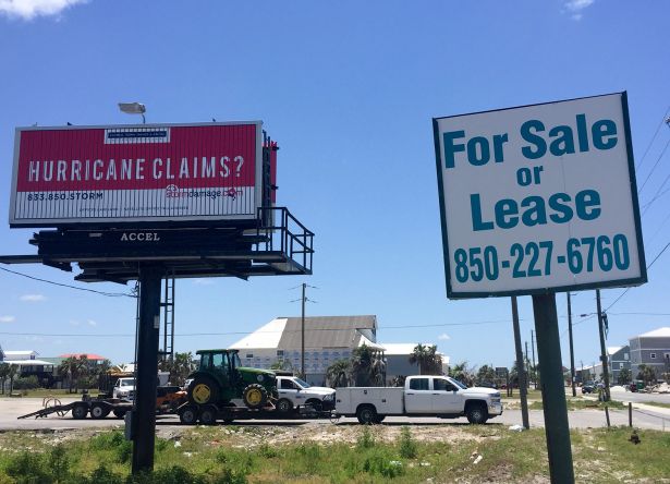 Billboard advertising hurricane insurance and repairs.