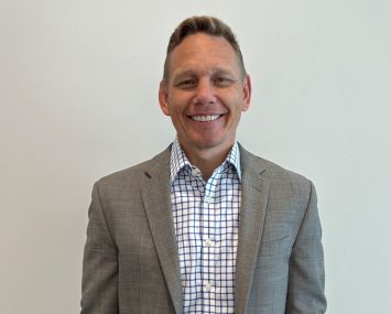 A photo of Newmark's Clint Frease.