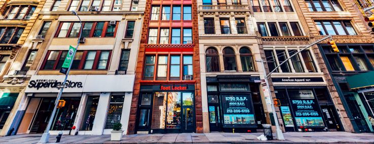 A photo of buildings with retail in Manhattan's SoHo.