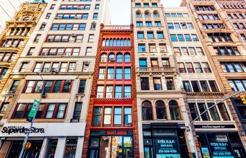 A photo of buildings with retail in Manhattan's SoHo.