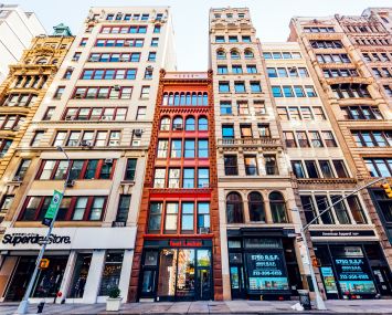 A photo of buildings with retail in Manhattan's SoHo.