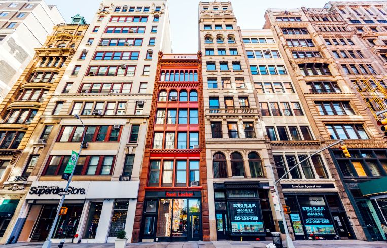 A photo of buildings with retail in Manhattan's SoHo.