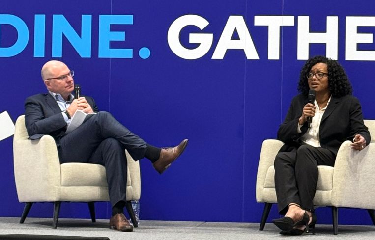 ICSC President and CEO Tom McGee, and Angele Robinson-Gaylord, senior vice president of store development for the Americas at Starbucks speak during a fireside chat at ICSC New York.