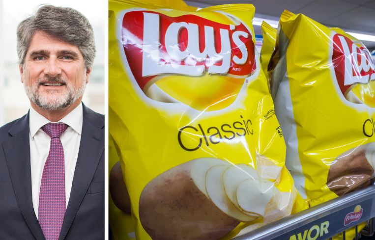 Bridge Investment Group CEO Jonathan Slager and bags of Lay's chips on a shelf.