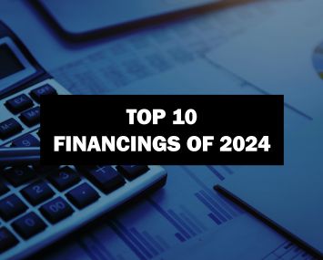 An image of a calculator with the words "Top 10 financings of 2024" in front of it.