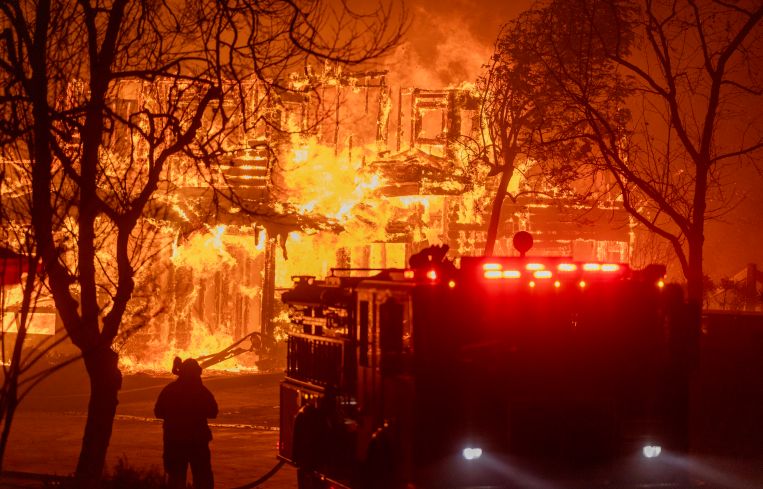Firefighters battle the Eaton Fire in strong winds as many homes burn in Pasadena. A powerful Santa Ana wind event has dramatically raised the danger of wind-driven wildfires such as the dangerous and destructive Palisades Fire near Santa Monica.