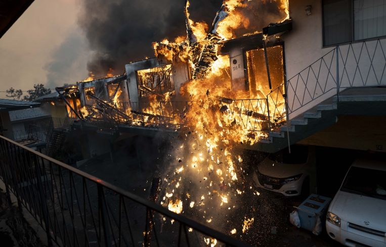 Apartments seen on fire from the Eaton Fire in Altadena, California.