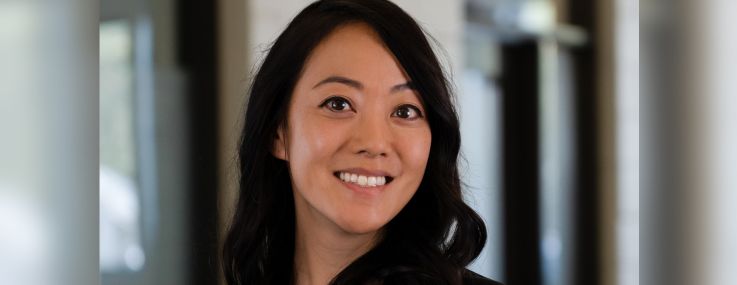 A woman smiling.