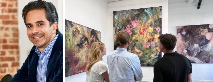 Matthew Mandell of GFP Real Estate and a group of people looking at paintings