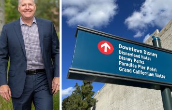 Dynamic City's chief investment officer Ryan Phelps and a sign directing people to hotels near Disneyland.